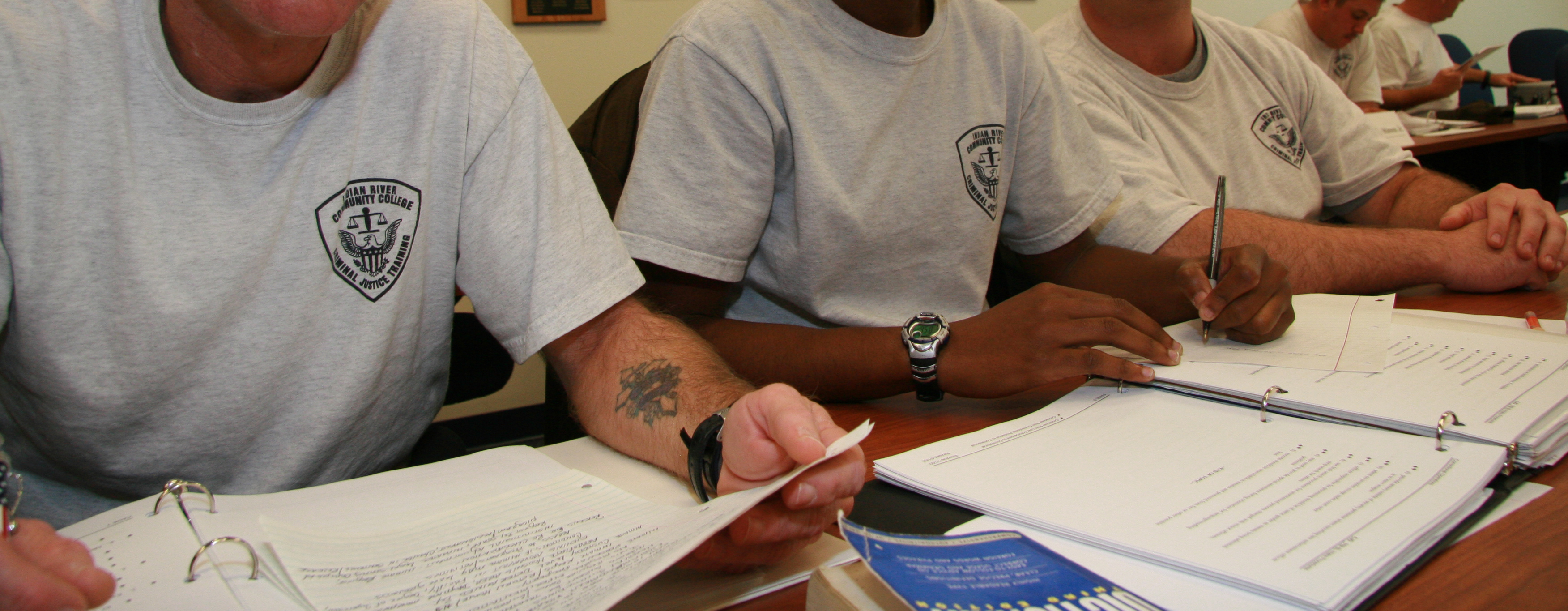 Law Enforcement students taking notes in class