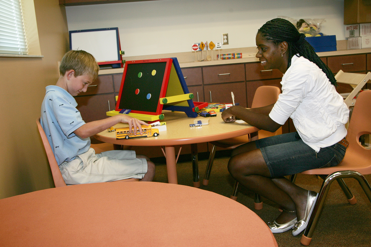 Student learning practicing play therapy